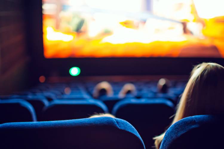 People watching a movie in a movie theatre