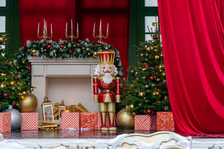 nutcracker decor by a christmas tree