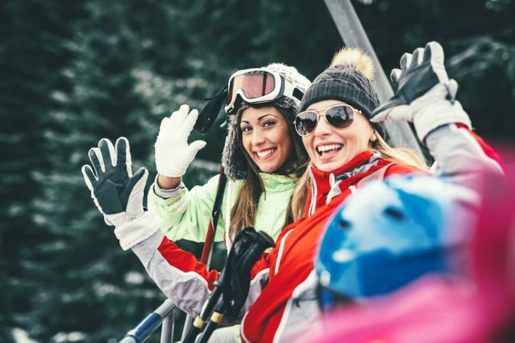 women on ski lift