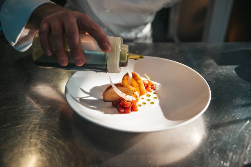 private chef plating a dish